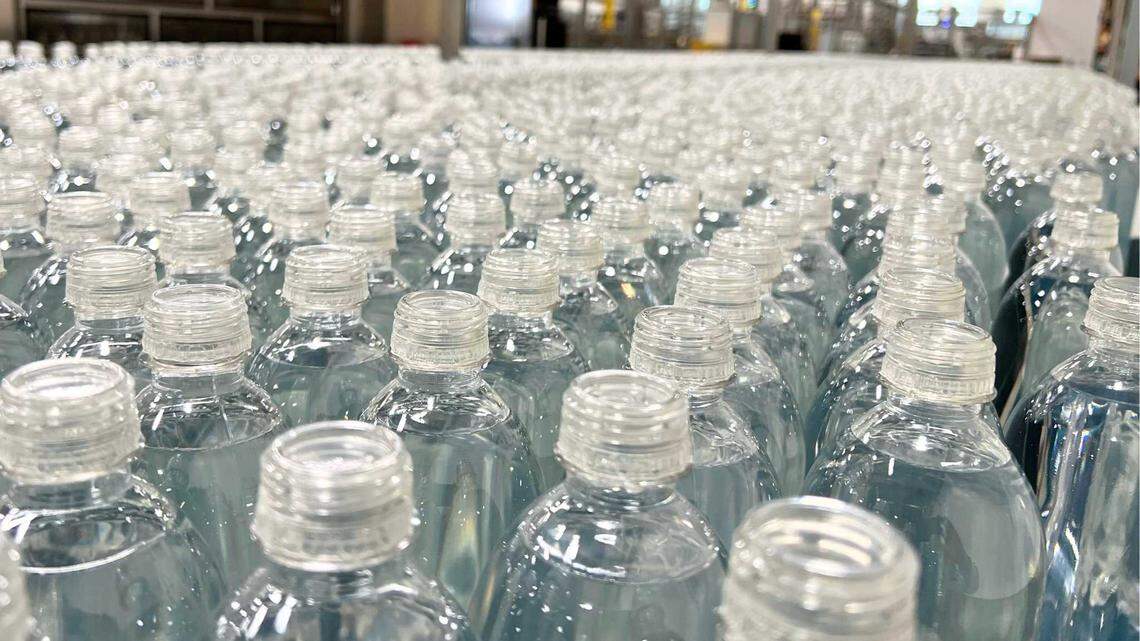 Origin Materials, a West Sacramento-based company that produces more-recyclable plastics like these bottle caps, announced this week that it is cutting operating expenses and reducing its global workforce by about a third as it works to deliver its PET caps to major beverage brands.