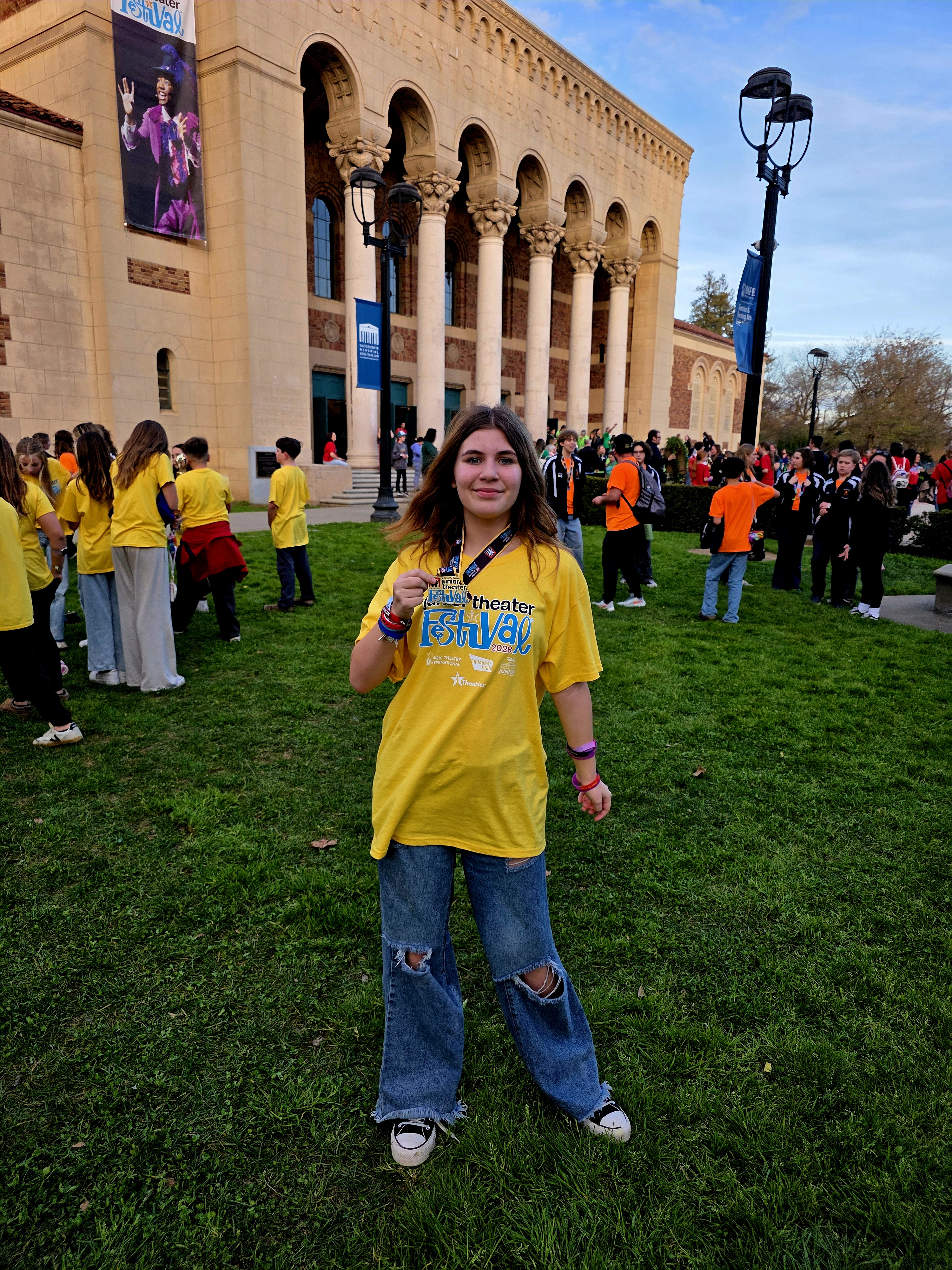 Kailey Nettleton (who played Nancy) with the medal awarded at...