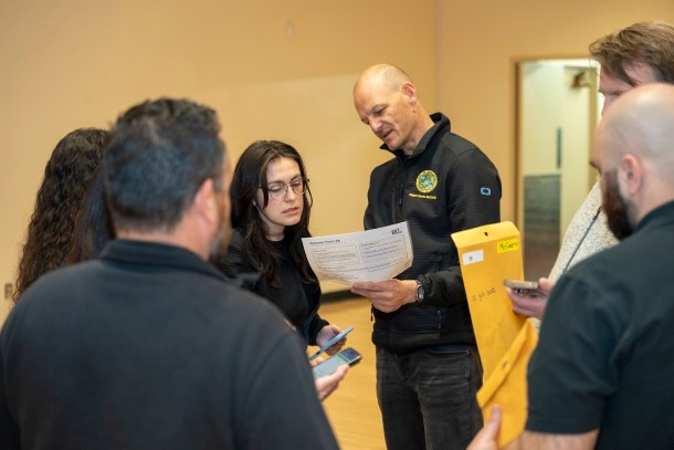 Mayor Kevin McCarty and his team go over their map of where they counted unhoused residents in the 2026 Point-in-Time Count. Russell Stiger Jr., OBSERVER