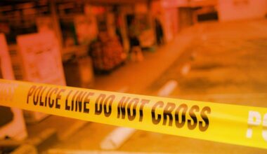 Police tape blocks entrance to a convenience store in San Luis Obispo County.