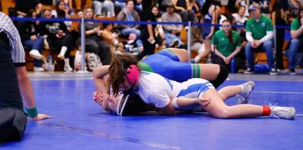 Rancho Bernardo's Penelope Pepperdine-Le pinned all four of her opponents at 125 pounds to capture the section Division 1 crown on her 18th birthday on Feb. 6. (Janell Chavez Riley)