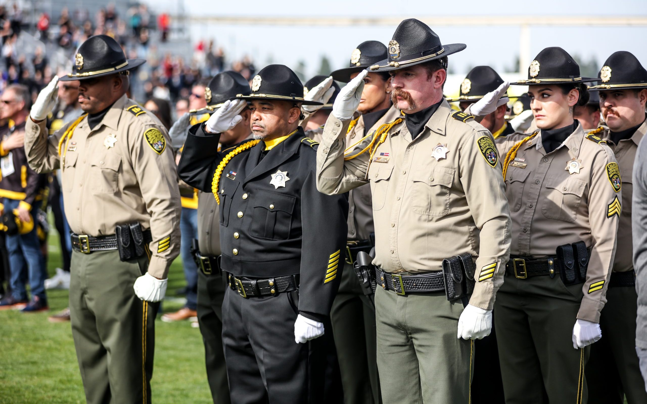 CDCR and parole Honor Guards at Pig Bowl 2026 honor Parole Agent Joshua Byrd who was killed in July 2025.