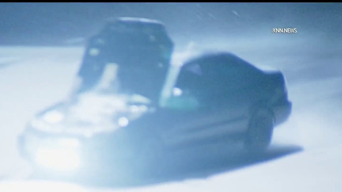 Pursuit driver speeds through LA River with hood lifted up – NBC Los Angeles