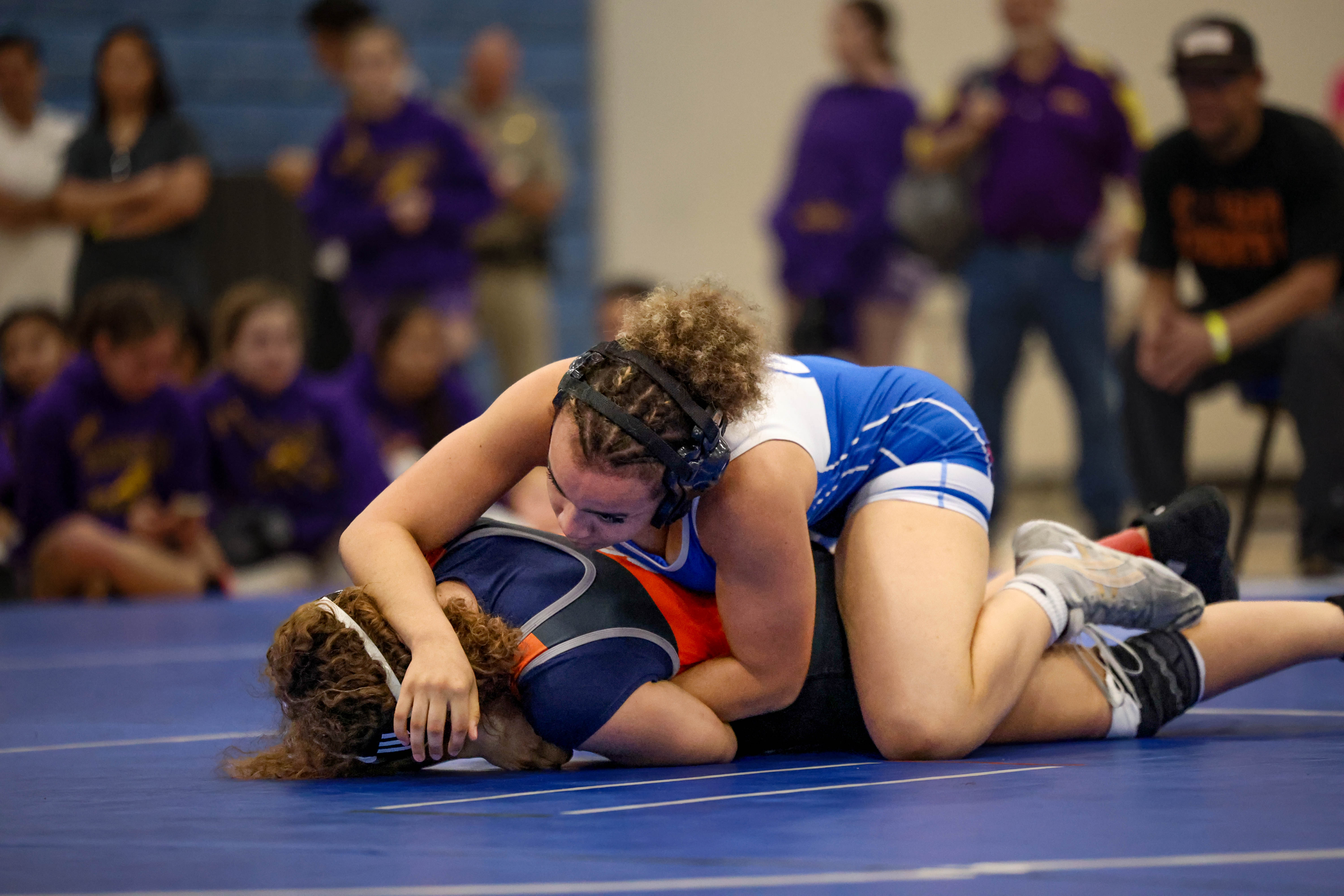 Placing second in her title match and scoring 18 points...