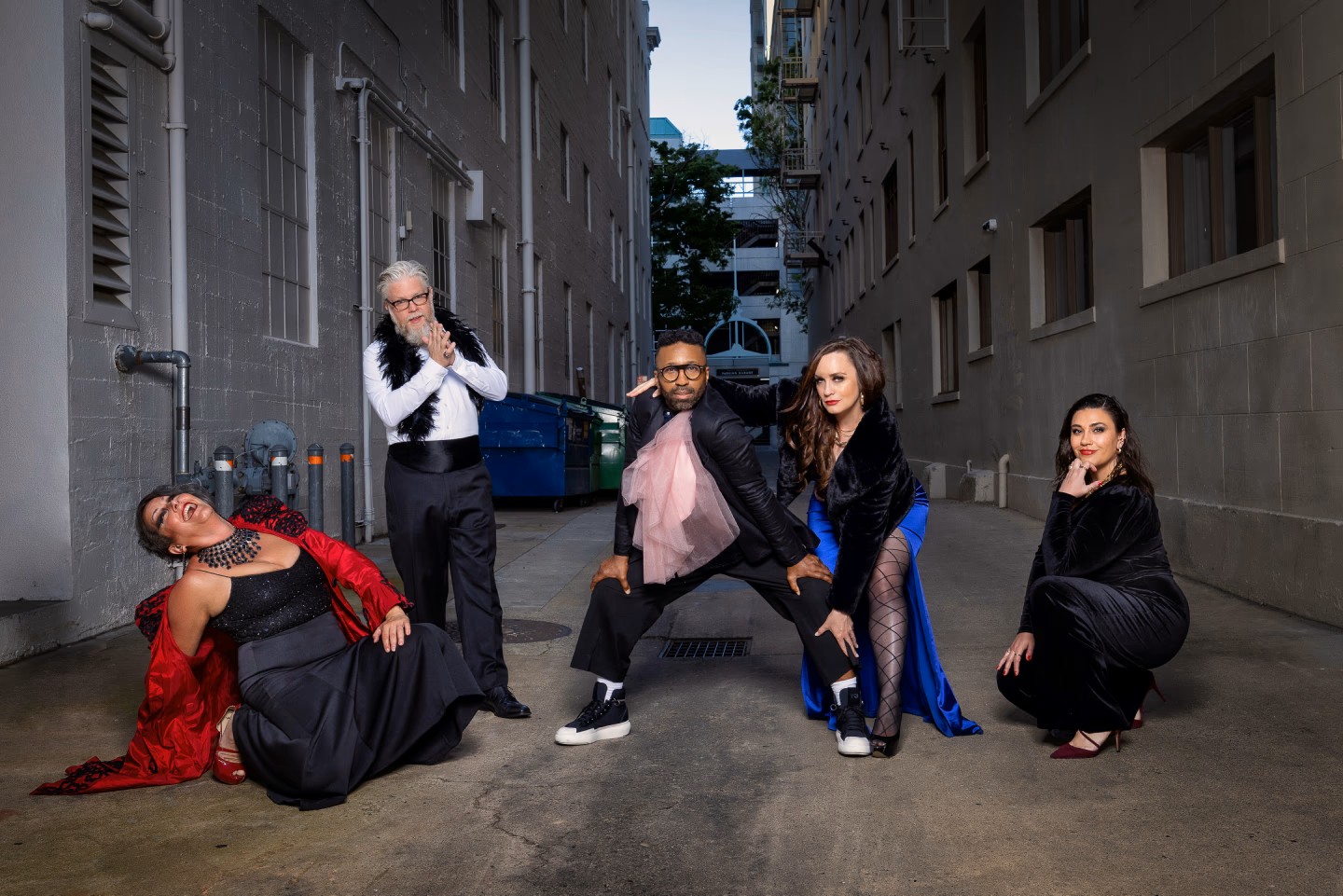 A band stands in a alley