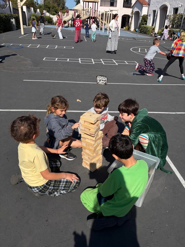Rowe Leadership students played lunchtime games with elementary school students. (Courtesy RSF School District)
