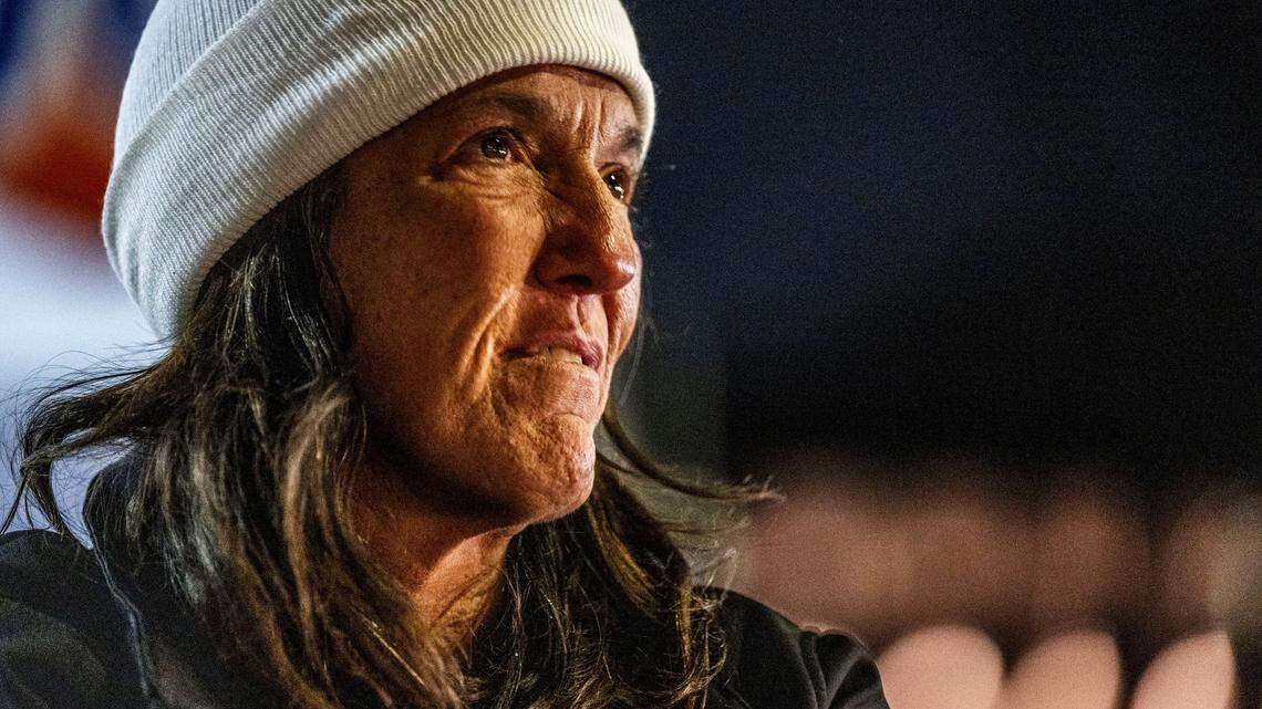 Lory Yvonnegrubb, homeless for five years, sits near the street on Howe Avenue. State Senator Angelique Ashby, D-Sacramento, is pushing legislation that would compel local governments to work together to get homeless people off county streets.