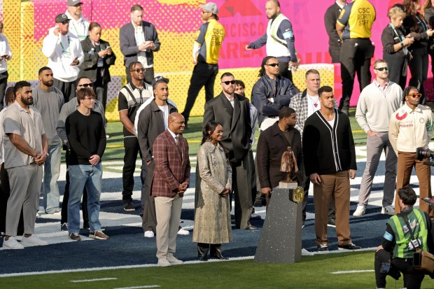 SANTA CLARA, CALIFORNIA - FEBRUARY 08: (L-R) Jordan Mailata, Curtis Robinson, Alex Highsmith, Cameron Dicker, Bobby Okereke, Jordan Love, Jarrett Payton, Brittney Payton, Travis Kelce, Kyren Williams, Grant Delpit, Bobby Wagner, Garett Bolles, Arik Armstead, Logan Cooke and Kenny Moore II are seen during the Super Bowl LX at Levi's Stadium on February 08, 2026 in Santa Clara, California. (Photo by Neilson Barnard/Getty Images)