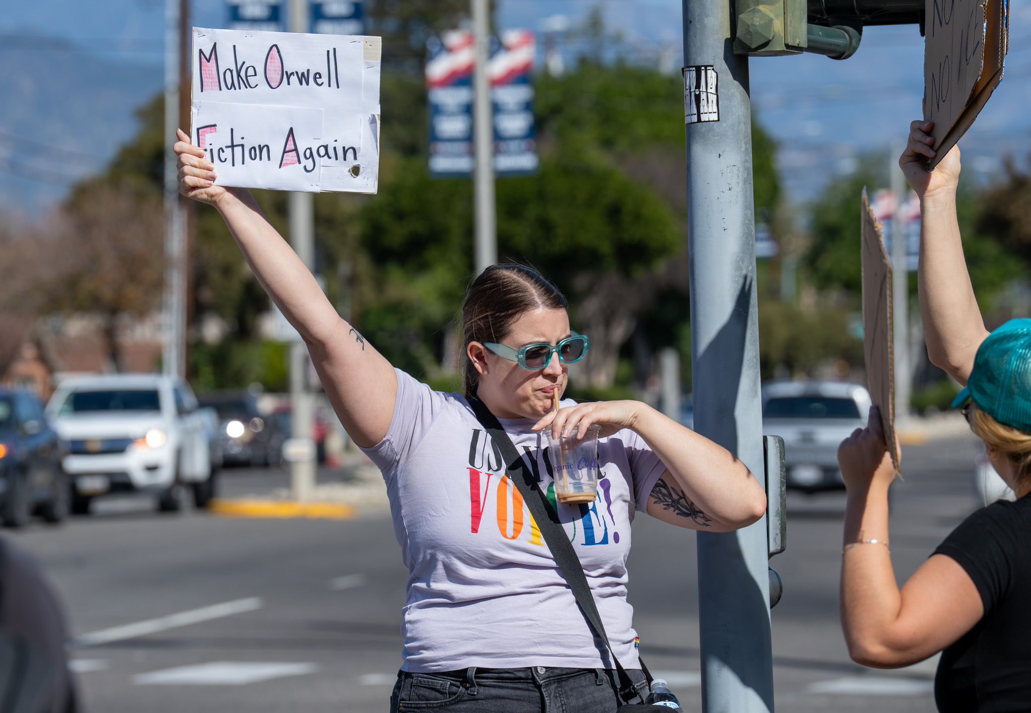 Hanna Hickson drinks coffee during an Ice Out of LA...