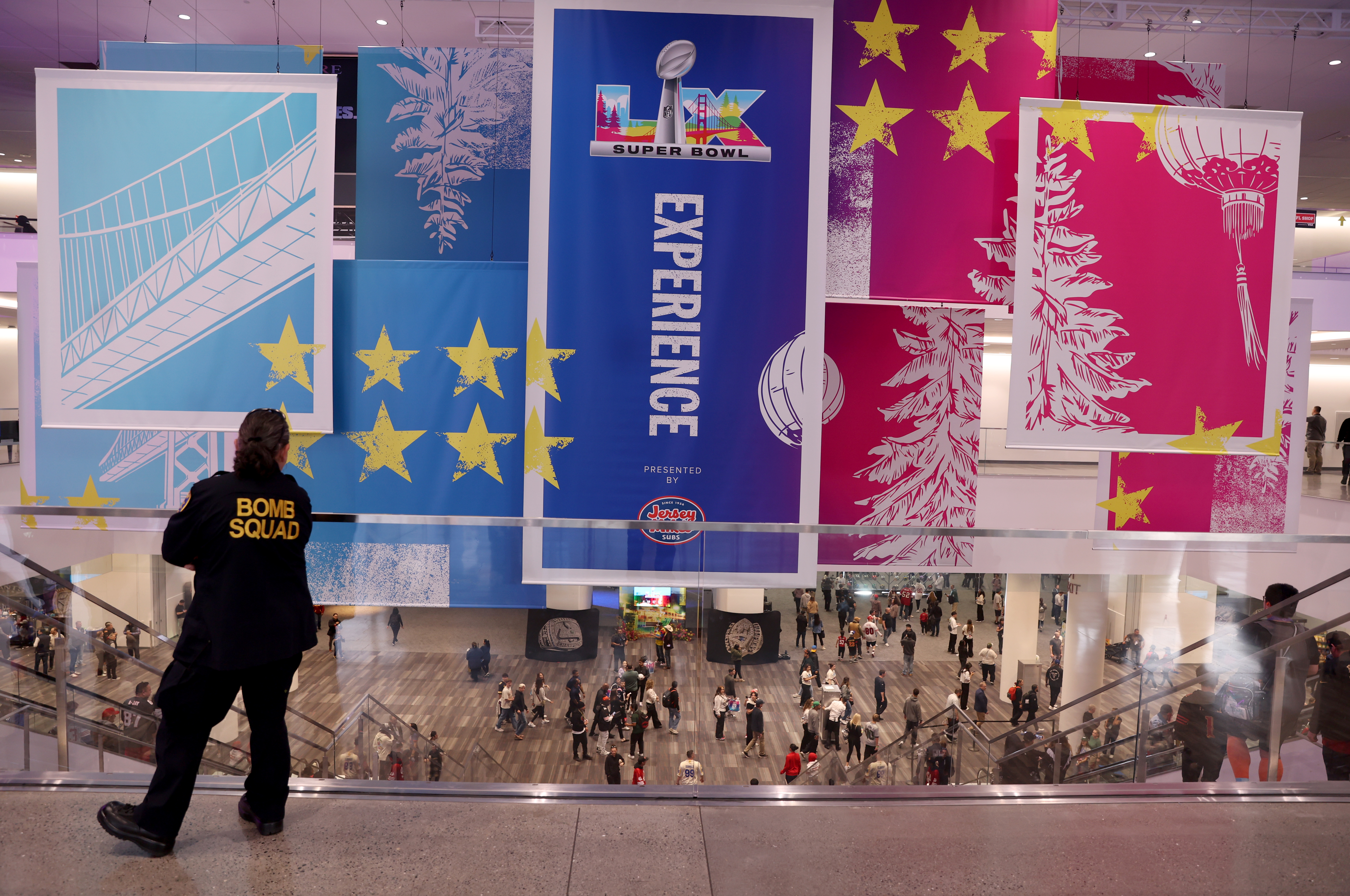 A bomb squad member looks on during the first day...