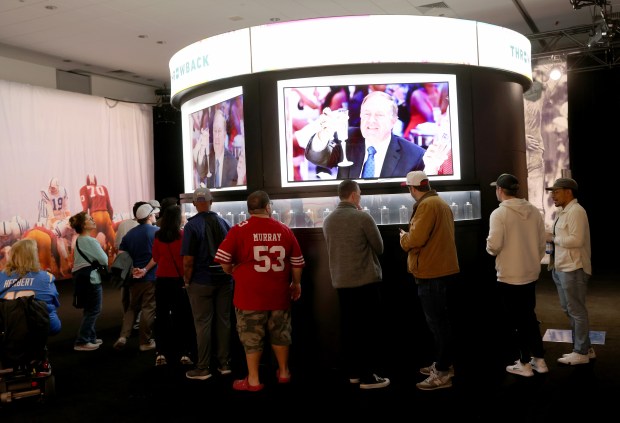 NFL fans view all 59 past Super Bowl rings during the first day of the Super Bowl LX Fan Experience at the Moscone Center in San Francisco, Calif., on Tuesday, Feb. 3, 2026. (Jane Tyska/Bay Area News Group)