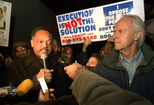 In 2004, Rev. Jesse Jackson, left, with the Rainbow Coalition speaking at the east gates of San Quentin Penitentiary after Mike Farrell, right, with the Death Penalty Focus told the crowd that the scheduled execution of condemned killer Kevin Cooper was called off for Tuesday morning ( Photo by Robert Tong/ Marin IJ Archives)