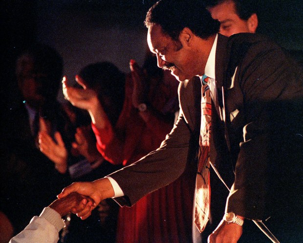 One of more than 1,000 educators welcomes the Rev. Jesse Jackson to San Jose  McEnery Convention Center in January of 2006 to meet with a the California Association of Bilingual Teachers  (Photo by Len Lahman/ Mercury News Archives)