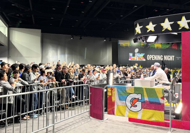 Fans crowd against a barrier to see a Seattle Seahawks player during Super Bowl Opening Night at the San Jose McEnery Convention Center on Monday, Feb. 2, 2026. (Sal Pizarro/Bay Area News Group)