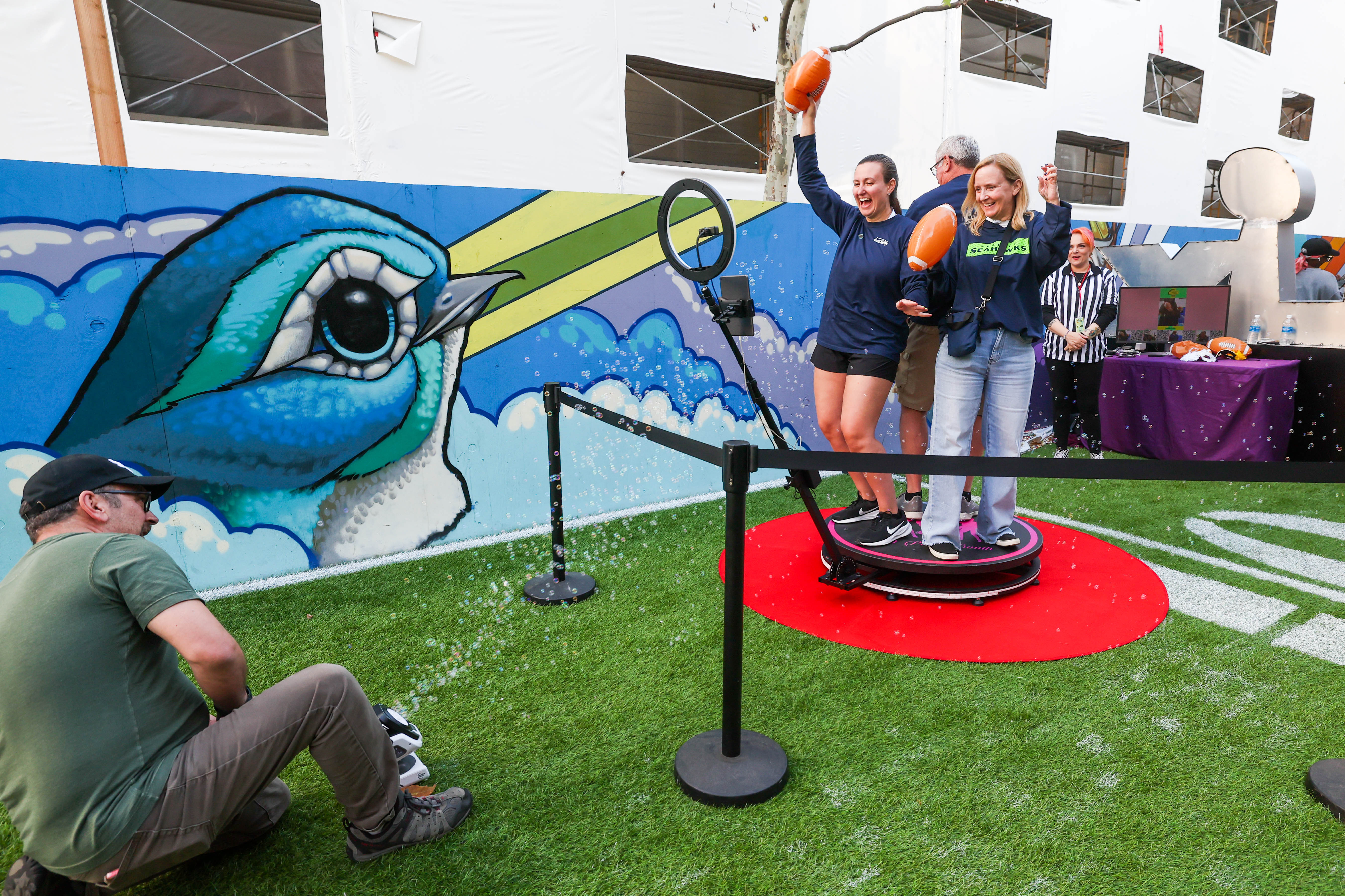 Seattle Seahawks fans Annie Brunner, left, and her parents, Todd...