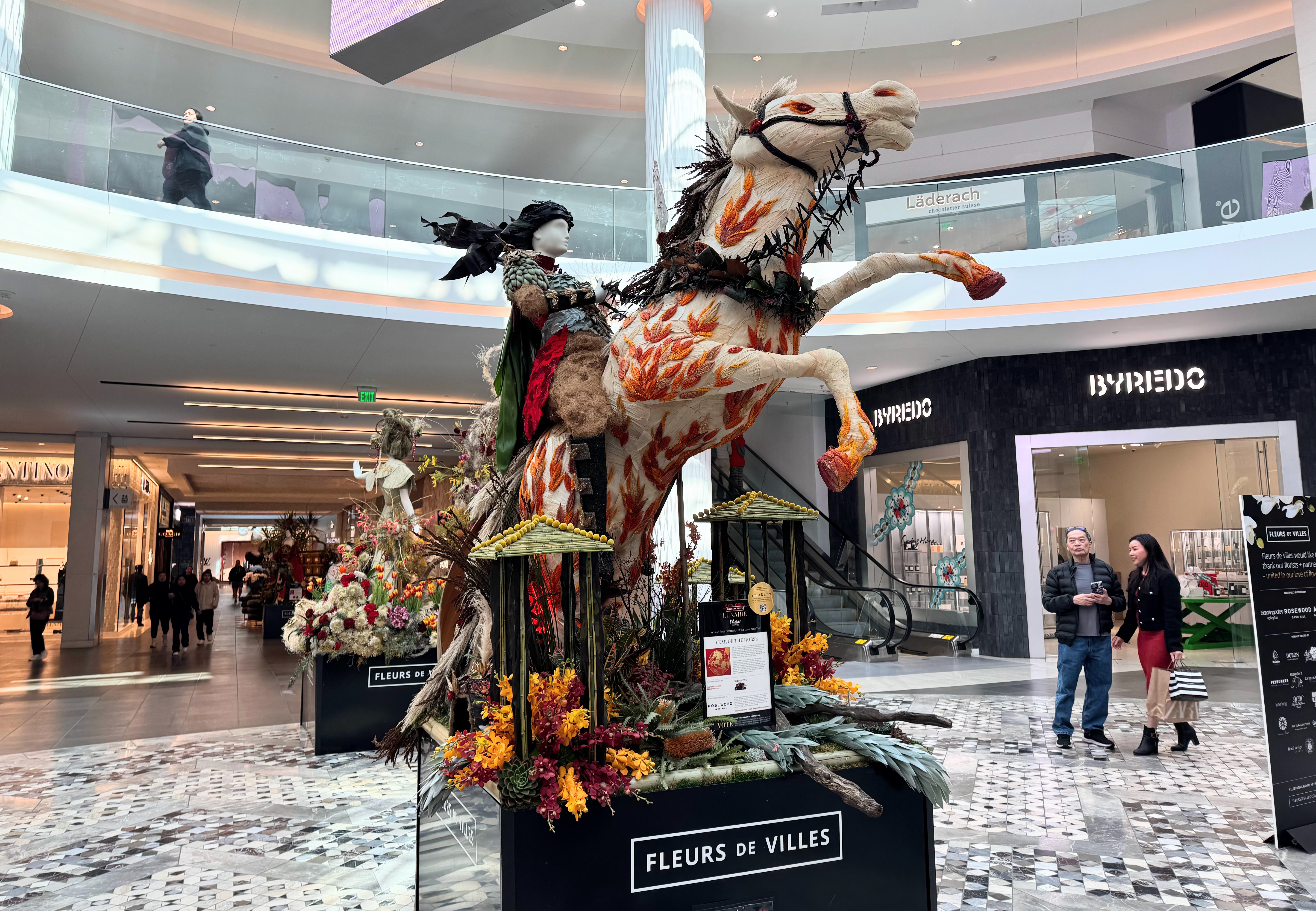 A floral and plant sculpture created by Bloomsters representing the...