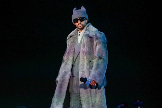 Super Bowl Halftime Show superstar Bad Bunny walks the stage during a Super Bowl LX pregame and Apple Music Halftime Show press conference at Moscone Center in San Francisco, Calif., on Thursday, Feb. 5, 2026. (Ray Chavez/Bay Area News Group)