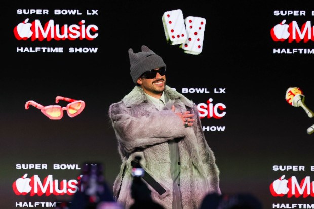 Super Bowl Halftime Show superstar Bad Bunny acknowledges members of the media after a Super Bowl LX pregame and Apple Music Halftime Show press conference with Apple Music Radio hosts Ebro Darden and Zane Lowe at Moscone Center in San Francisco, Calif., on Thursday, Feb. 5, 2026. (Ray Chavez/Bay Area News Group)