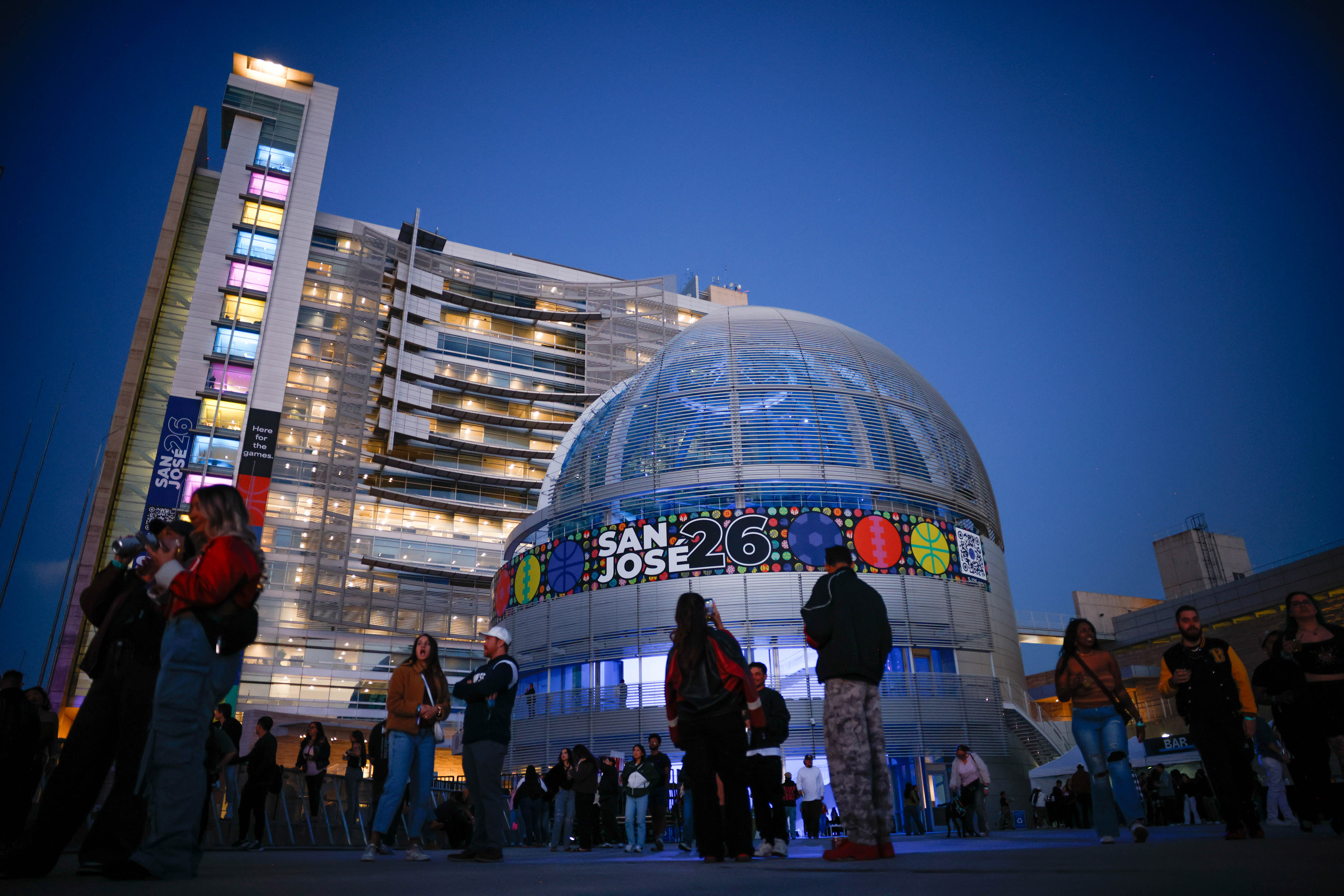 People gather for the Big Game Block Party on East...