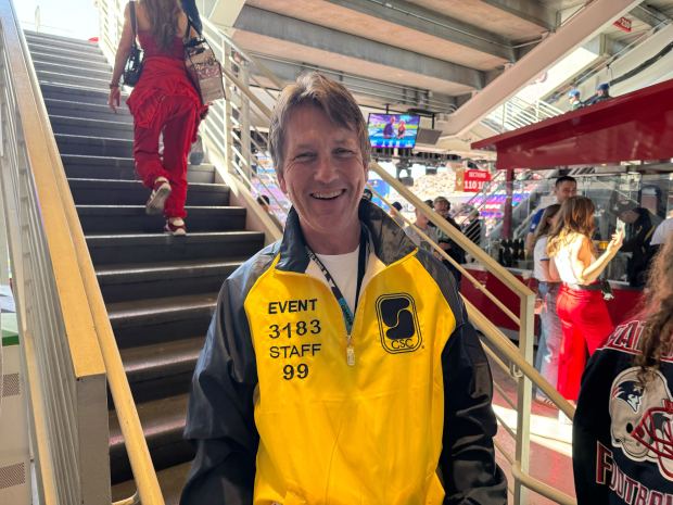 2:00, Section 211: San Jose resident Scott Weber is spending his 60th birthday as an usher at Levi's Stadium. His works as a lawyer for his day job but he and his wife started ushering at SAP Center years ago as a way to see more sports. When he found out Super Bowl LX was happening on his 60th birthday, he applied to work the game. "It's a lot of fun," said Weber, who was answering questions and providing directions to fans at Section 211. "It's the best job you could have."(Sal Pizarro/Bay Area News Group)