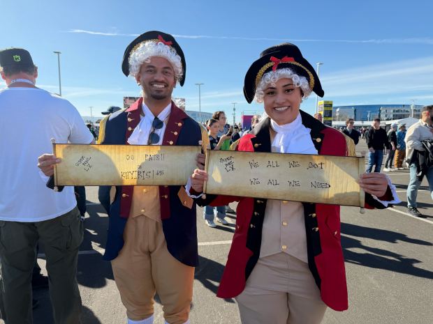 Inoke, 35, and Siesia Tonga, 30, both of Salt Lake City, UT, showed up to the Super Bowl in full Founding Fathers outfits, featuring white powdered wigs and 1700s suits, to support their brother Khyiris Tonga, who is playing for the Patriots. Each carried a scroll with messages of support written on them tab Super Bowl 60 at Levi's Stadium in Santa Clara, Calif., on Sunday, Feb. 8, 2026. (Caelyn Pender/Bay Area News Group)