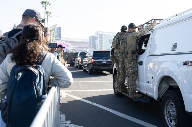 FBI are seen outside Levi's Stadium before the NFL Super Bowl 60 football game, Sunday, Feb. 8, 2026, in San Clara, Calif. (AP Photo/Jenny Kane)