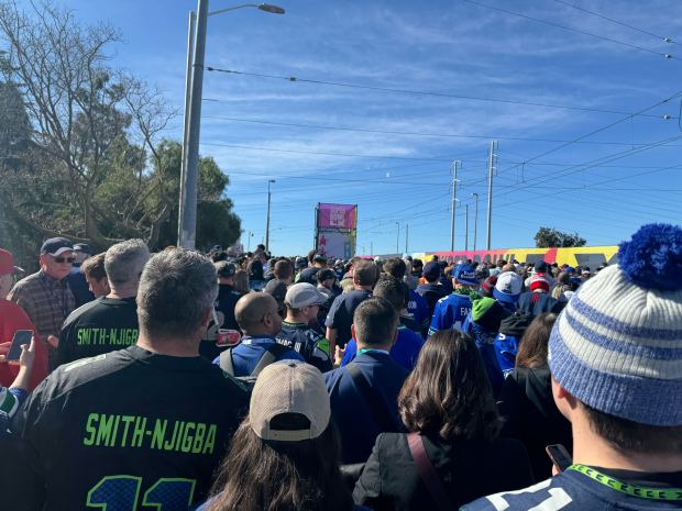 12:24: Tasman Drive is a sea of fans heading toward Levi's three hours before kickoff for Super Bowl 60 in Santa Clara, Calif., on Sunday, Feb. 8, 2026. (Sal Pizarro/Bay Area News Group)