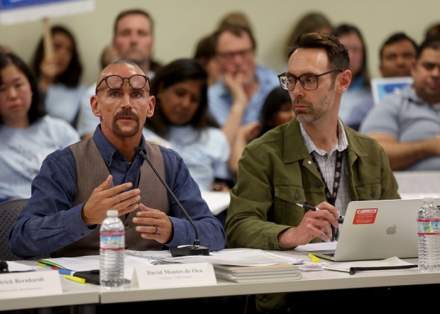 David Montes de Oca, left, speaks as San Jose Unified School District Chief Business Officer Seth Reddy listens during a meeting at the district headquarters in San Jose, Calif., on Tuesday, Feb. 10, 2026. Under the district's "Schools of Tomorrow" initiative to tackle declining enrollment, up to nine elementary schools could close by the beginning of the 2026-27 school year. (Jane Tyska/Bay Area News Group)