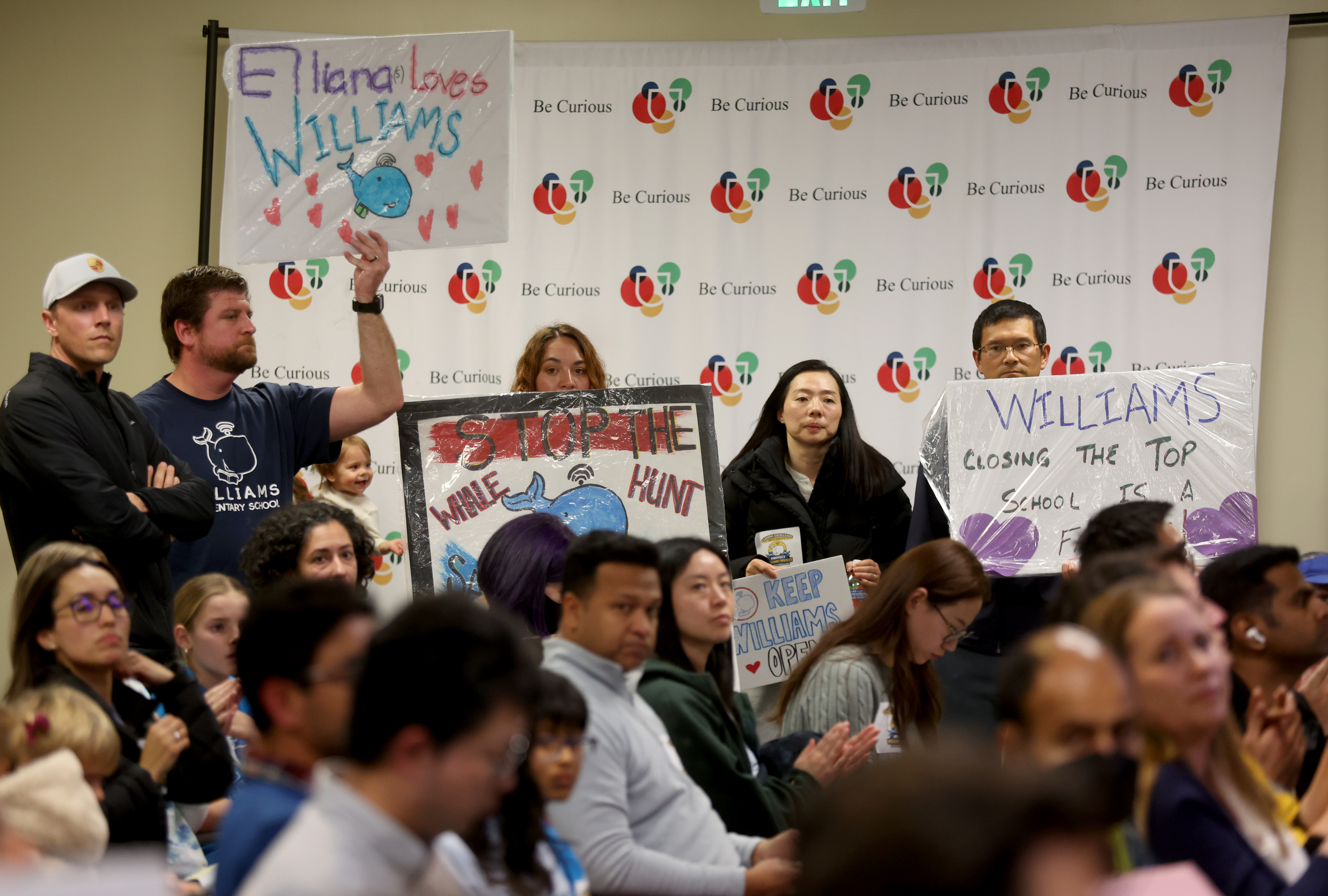 Community members attend a meeting at the San Jose Unified...