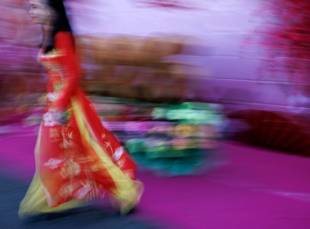 Dieu Vo of Milpitas attends the Tet Festival 2026 at Eastridge Center Friday, Feb. 20, 2026, in San Jose, Calif. The three-day festival includes live music and entertainment, lion dancers, a fashion show and carnival rides, as well as retail, food and drink vendors. (Dai Sugano/Bay Area News Group)