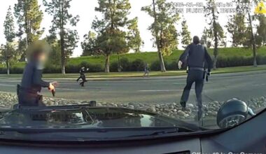 A police vehicle’s dash camera captures officers chasing a bank robbery suspect on Exposition Boulevard in the Point West neighborhood of Sacramento on Thursday, Jan. 29, 2026. Police said two officers fired six shots after the man turned and pointed what was later determined to be an imitation firearm.