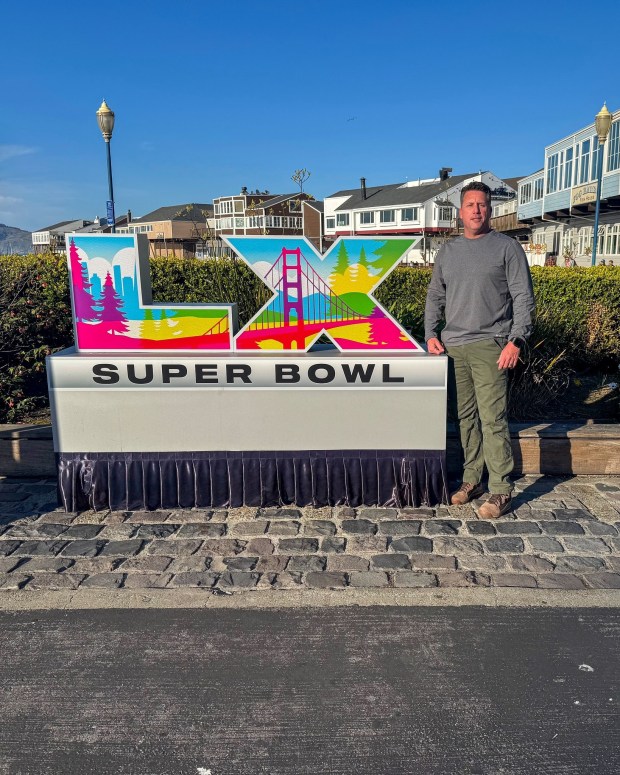 Humboldt County Deputy Sheriff Foy Melendy poses with a sculpture depicting the Super Bowl LX logo this weekend. (HCSO/Contributed)