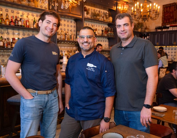 Robert Kronfli, left, Lior Hillel, executive chef, center, and Danny Kronfli, right, are the owners of Bacari, a new restaurant in North Park on 30th Street. It will open to the public on Monday, Feb. 9th. The restaurant is their first in San Diego County, with plans to open another location in Carlsbad. Photographed, Saturday, February 7, 2026, in San Diego, California.