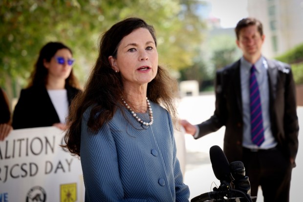 Attorney Gay Grunfeld speaks to reporters outside of the federal courthouse in downtown San Diego on Wednesday, July 24, 2025. (Sandy Huffaker for The San Diego Union-Tribune)