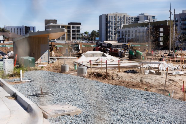 The under-construction East Village Green park, as pictured looking east from 13th and F streets on February 21, 2026. (Kristian Carreon / The San Diego Union-Tribune)