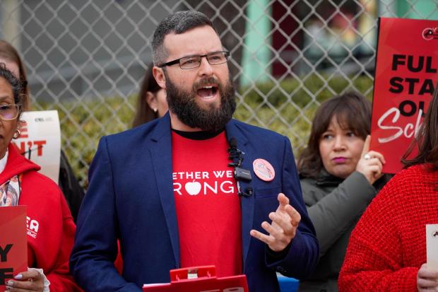 Teachers union leader Kyle Weinberg is pictured at a press conference on Feb. 4, 2025. (Alejandro Tamayo / The San Diego Union-Tribune)