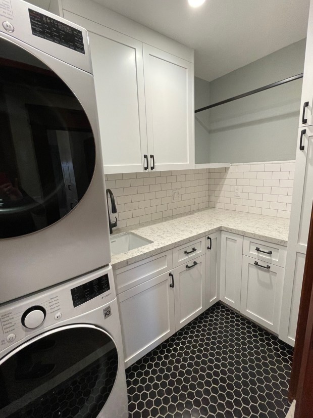 After, Sheryl Chaffee of Ntrada Design stacked the appliances and created multiple zones for tasks. (Ntrada Design)