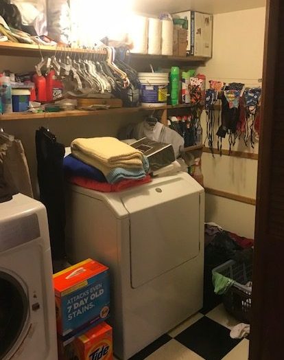 Before, an Ntrada client's laundry lacks functional areas for different tasks. (Ntrada Design)