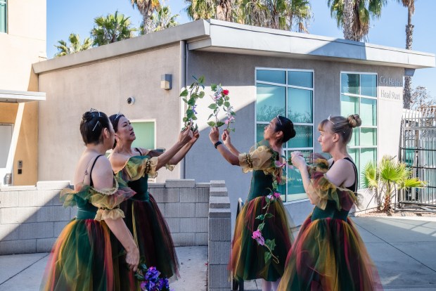 Students from the San Diego Ballet before performing at the City Heights Multicultural Festival of Love on Feb. 22, 2025. The "celebration promotes Diversity, Solidarity and Love while providing a space where diverse perspectives, cultures and values are accepted, appreciated and celebrated." (Ariana Drehsler / For The San Diego Union-Tribune)