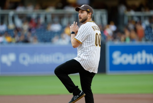 Comedian Zoltan Kaszas threw out the ceremonial first pitch before a Padres game at Petco Park on Sept. 10, 2025 in San Diego, CA. (K.C. Alfred / The San Diego Union-Tribune)