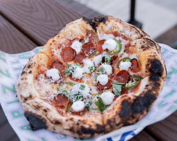 A wood-fired hand-tossed pizza from Marcella Pizzeria. (Pali Wine Co.)