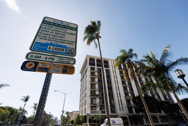 A pay-by-plate parking sign in Bankers Hill in San Diego on Friday, Feb. 13, 2026. (Kristian Carreon / The San Diego Union-Tribune)