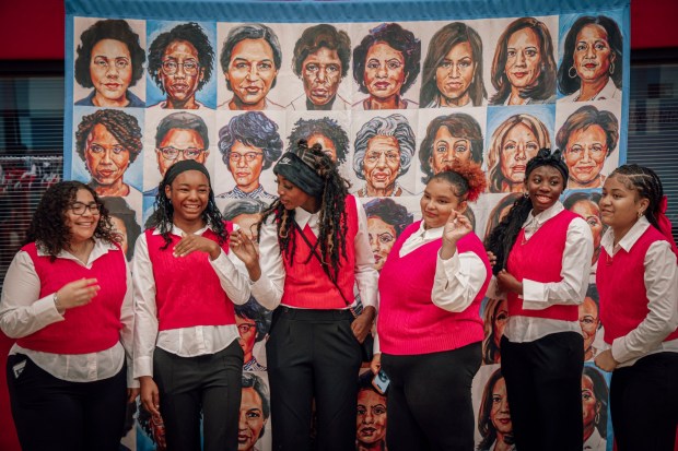 Students in the F.A.N.C.Y program stand in front og a wall of Woman heroes during the 8th Annual ROAR Black History Month Breakfast at City College in Downtown on Saturday, Feb 7, 2026. This award breakfast recognizes 15+ years of impact through our F.A.N.C.Y. programs. (Sandy Huffaker / For The San Diego Union-Tribune)