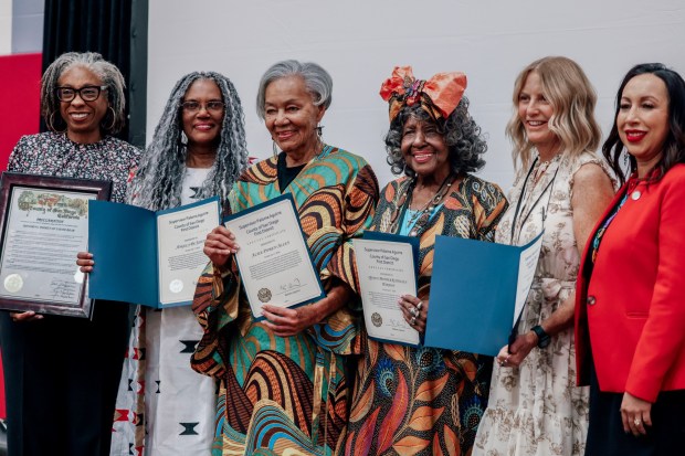 Monica Montomery Steppe, Angela De Joseph, Alice Pipken-Allen, Quenn Mother Kathleen Harmon, Tama Becker Verano and Paloma Aguirre hold a ceritficate honoring Women of Color Day during the 8th Annual ROAR Black History Month Breakfast at City College in Downtown on Saturday, Feb 7, 2026. This award breakfast recognizes 15+ years of impact through our F.A.N.C.Y. programs. (Sandy Huffaker / For The San Diego Union-Tribune)