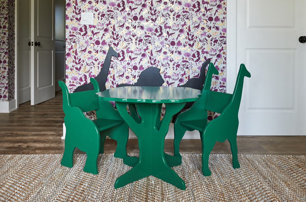 The child’s table has chairs that capture the imagination. (Bungalow...