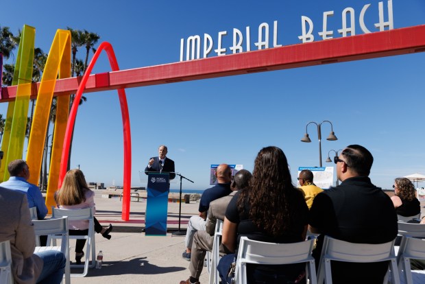 Imperial Beach Mayor Mitch McKay speaks during a groundbreaking ceremony for the future "splash pad" in Imperial Beach on Wednesday, Feb. 25, 2026. The splash pad will include arched water jets, updated sidewalks and accessible showers. Construction is expected to complete by the end of the year. (Kristian Carreon / The San Diego Union-Tribune)