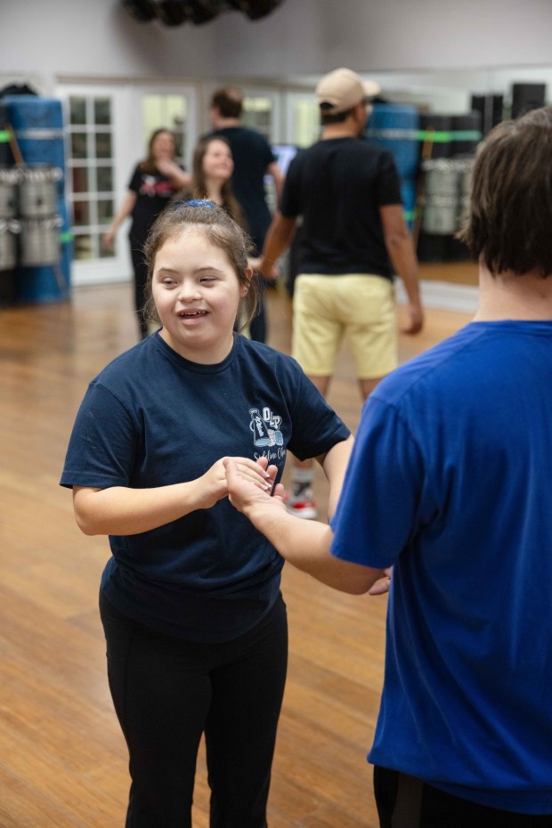 Faith Tysee takes a swing dance class at Arms Wide Open in El Cajon on Jan. 29. (Zoë Meyers / For The San Diego Union-Tribune)