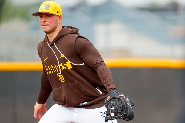 Ty France #4 of the San Diego Padres participates in drills during spring training workouts at the Peoria Sports Complex on Monday, Feb. 16, 2026 in Peoria, Ariz.(Meg McLaughlin / The San Diego Union-Tribune)