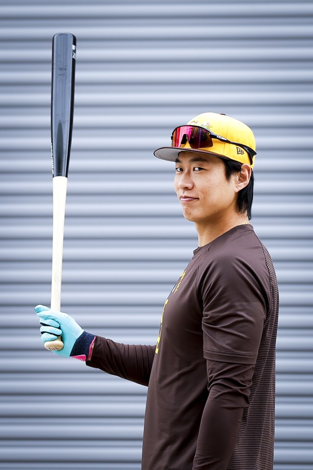 Sung-Mun Song #24 of the San Diego Padres looks on during the first day of spring training workouts at the Peoria Sports Complex on Wednesday, Feb. 11, 2026 in Peoria, Ariz.(Meg McLaughlin / The San Diego Union-Tribune)