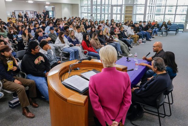 In the jury lounge of the Vista Courthouse local high school students participating the Youth In Court program listen to convicted murderer Tony Hicks, at right, speak. Back to camera is Judge Joan Weber, who presided at his trial. With Tony are family members of Tariq Khamisa, the man Tony killed- his father Azim Khamisa and his sister Tasreen Khamisa. (Charlie Neuman / For The San Diego Union-Tribune)
